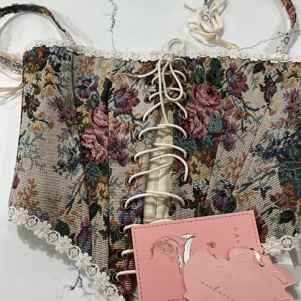 Beautiful vintage corset with tags.